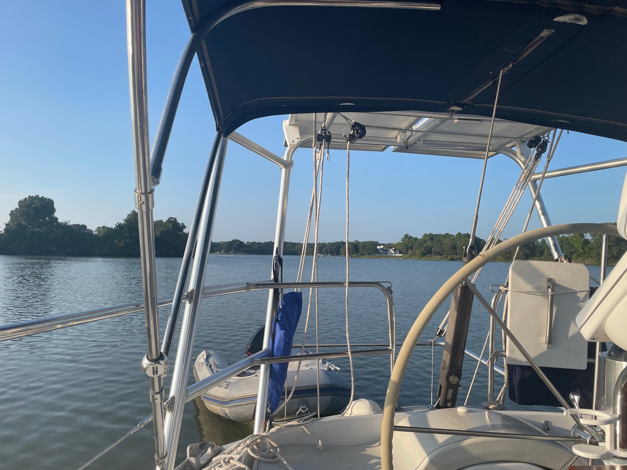Proud Mary cockpit at anchor with custom solar arch